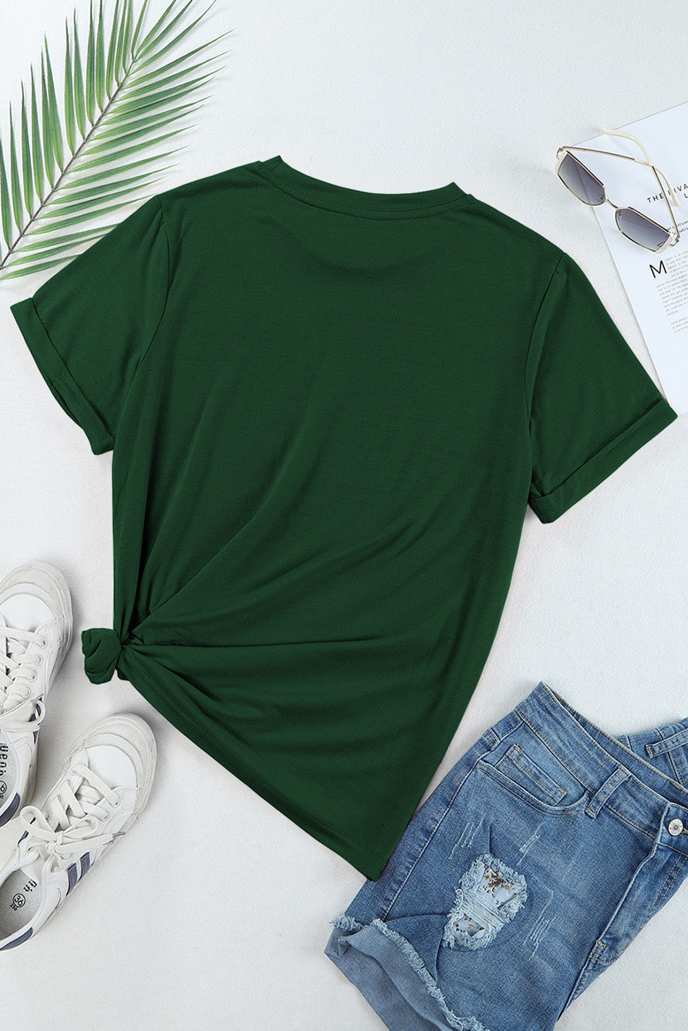 Dark green cotton blend t-shirt with cuffed sleeves and a knotted hem.
