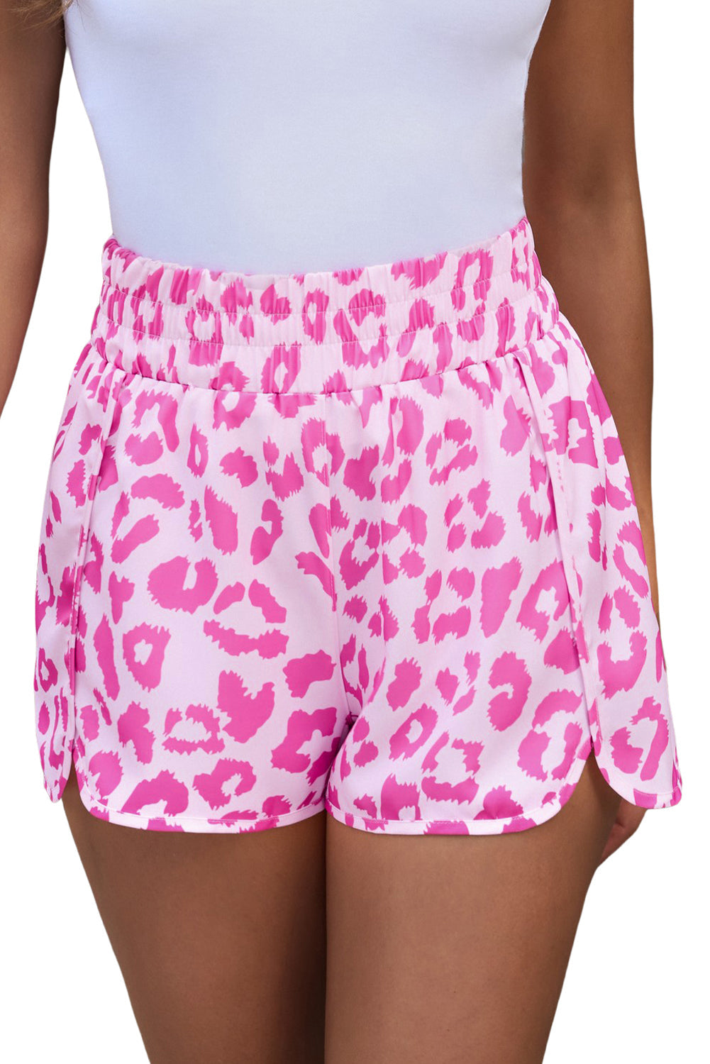 Pink leopard print shorts with elastic waistband and scalloped hem