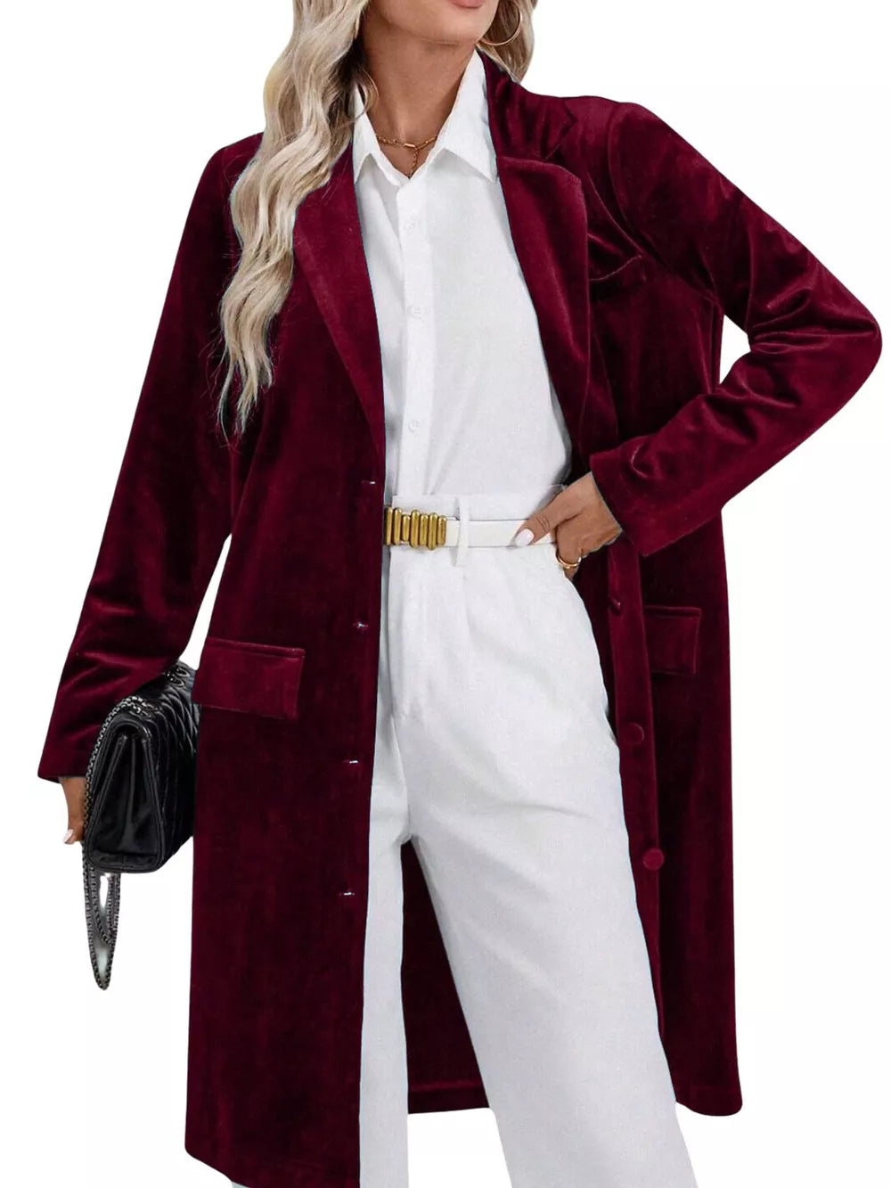 Burgundy velvet longline trench coat with lapel collar and buttoned front.