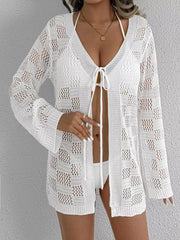 White openwork crochet tie-front cover-up with bell sleeves and a V-neck.