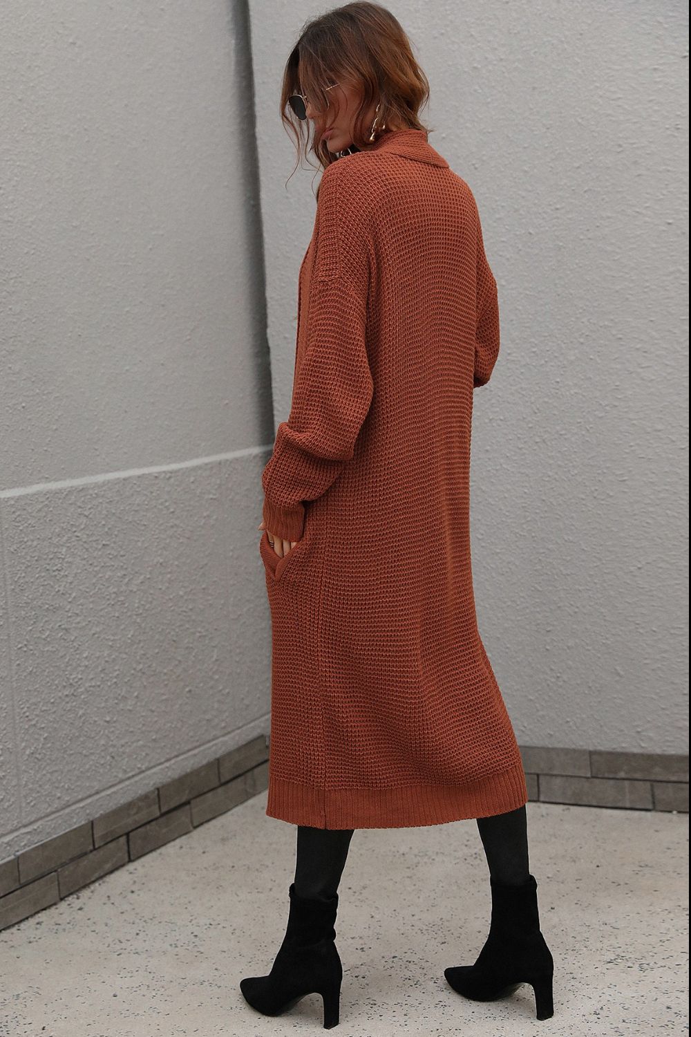 Textured knit maxi cardigan in brown with pockets and a shawl collar.