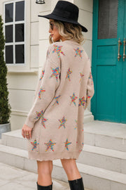 Embroidered starburst knit cardigan in Dust Storm with colorful star pattern.