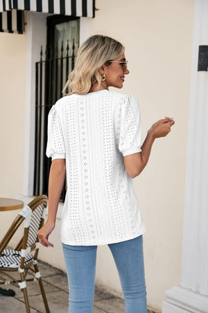 White perforated puff sleeve v-neck blouse with eyelet detail