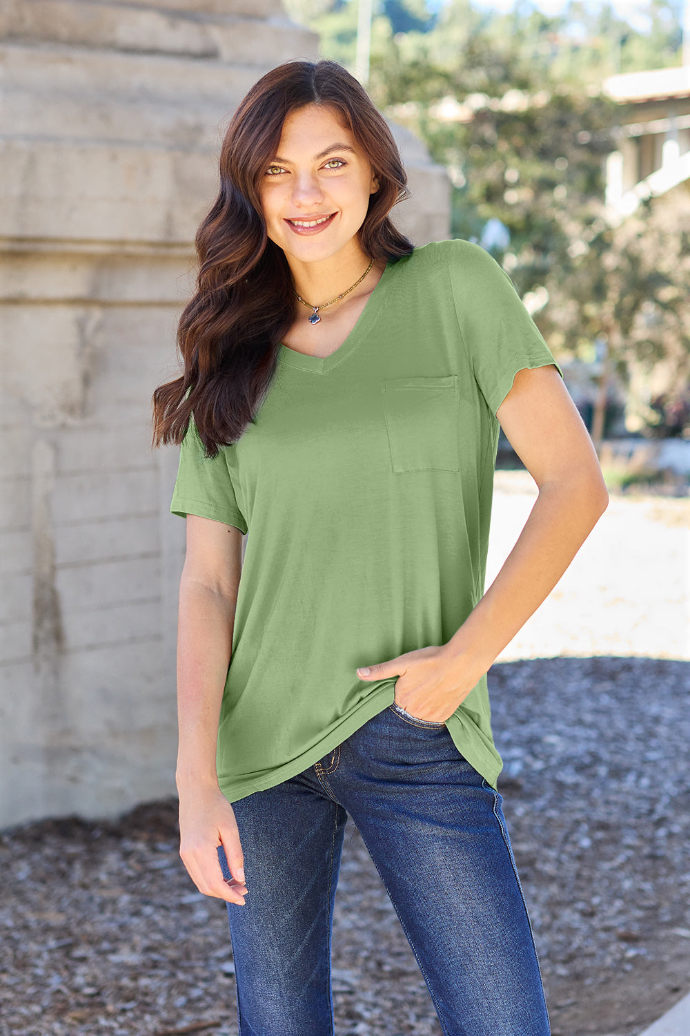 V-neck pocket tee in Matcha Green with short sleeves and a relaxed fit.