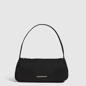 Black mini nylon shoulder bag with a sleek design and silver accent.