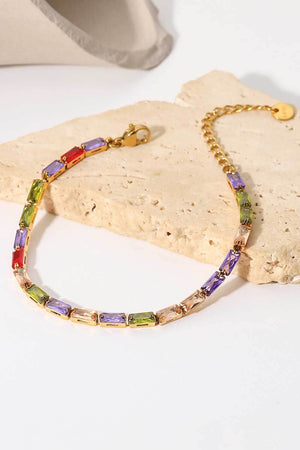 Gold chain bracelet with multi-colored baguette crystals