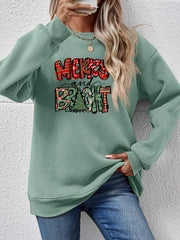 Sage green crewneck sweatshirt with Merry and Bright Christmas graphic and festive patterns.