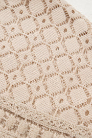 Beige waffle knit lace yoke top detail showing intricate openwork pattern.