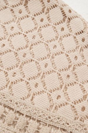 Beige waffle knit lace yoke top detail showing intricate openwork pattern.