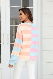 Pastel block stripe crewneck pullover sweater in orange, blush pink, and light blue acrylic.