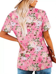 Pink floral ruched v-neck t-shirt with short sleeves.