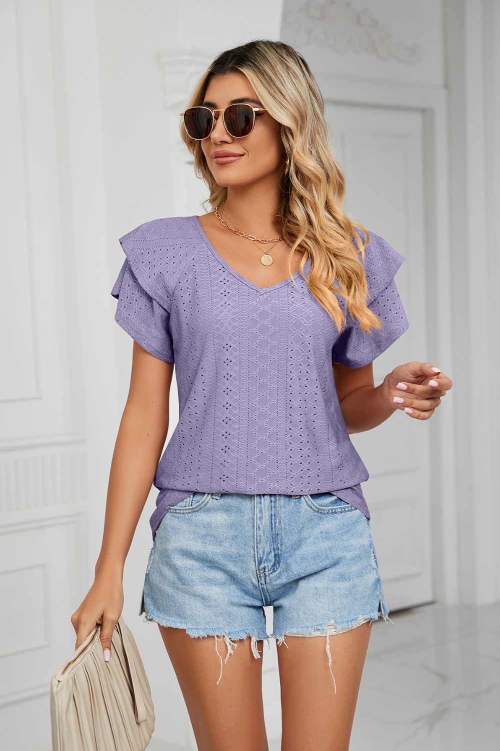 Lavender eyelet knit v-neck blouse with flutter sleeves