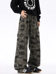 Urban camouflage cargo sweatpants with drawstring waist and multiple pockets.