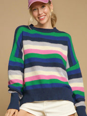 Chunky knit crewneck sweater with bold horizontal stripes in green, blue, navy, pink, and cream.