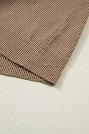 Brown ribbed knit mock neck sweater vest with polyester fabric detail.