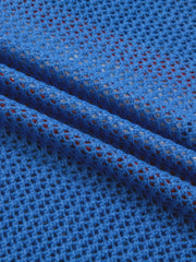 Patriotic flag graphic knit top in blue acrylic with a crew neck and open knit detail.