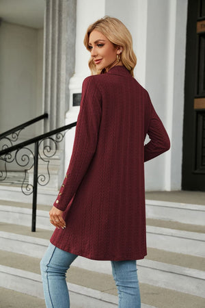 Burgundy textured knit duster cardigan with button detail on sleeve cuff