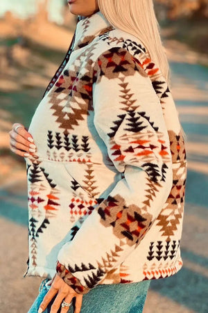 Southwestern quilted zip-up jacket in eggshell with geometric pattern, full zip, and pockets.