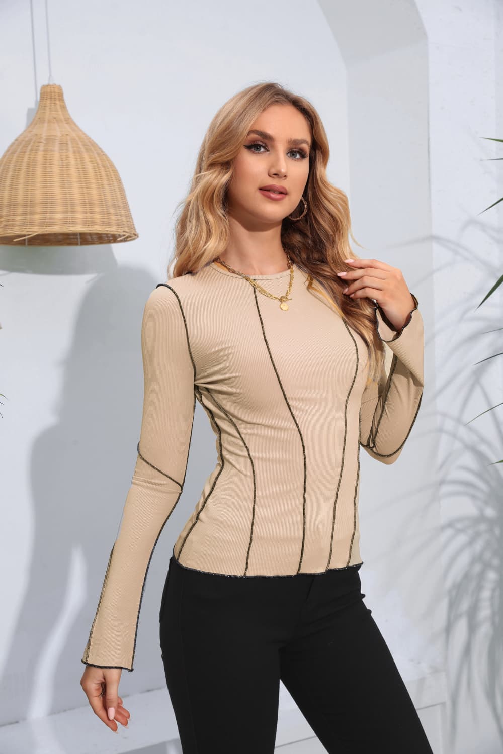 Tan ribbed long sleeve top with contrast stitching and crew neck.