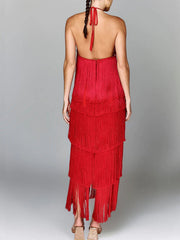 Red halter neck maxi dress with tiered fringe detail and open back.