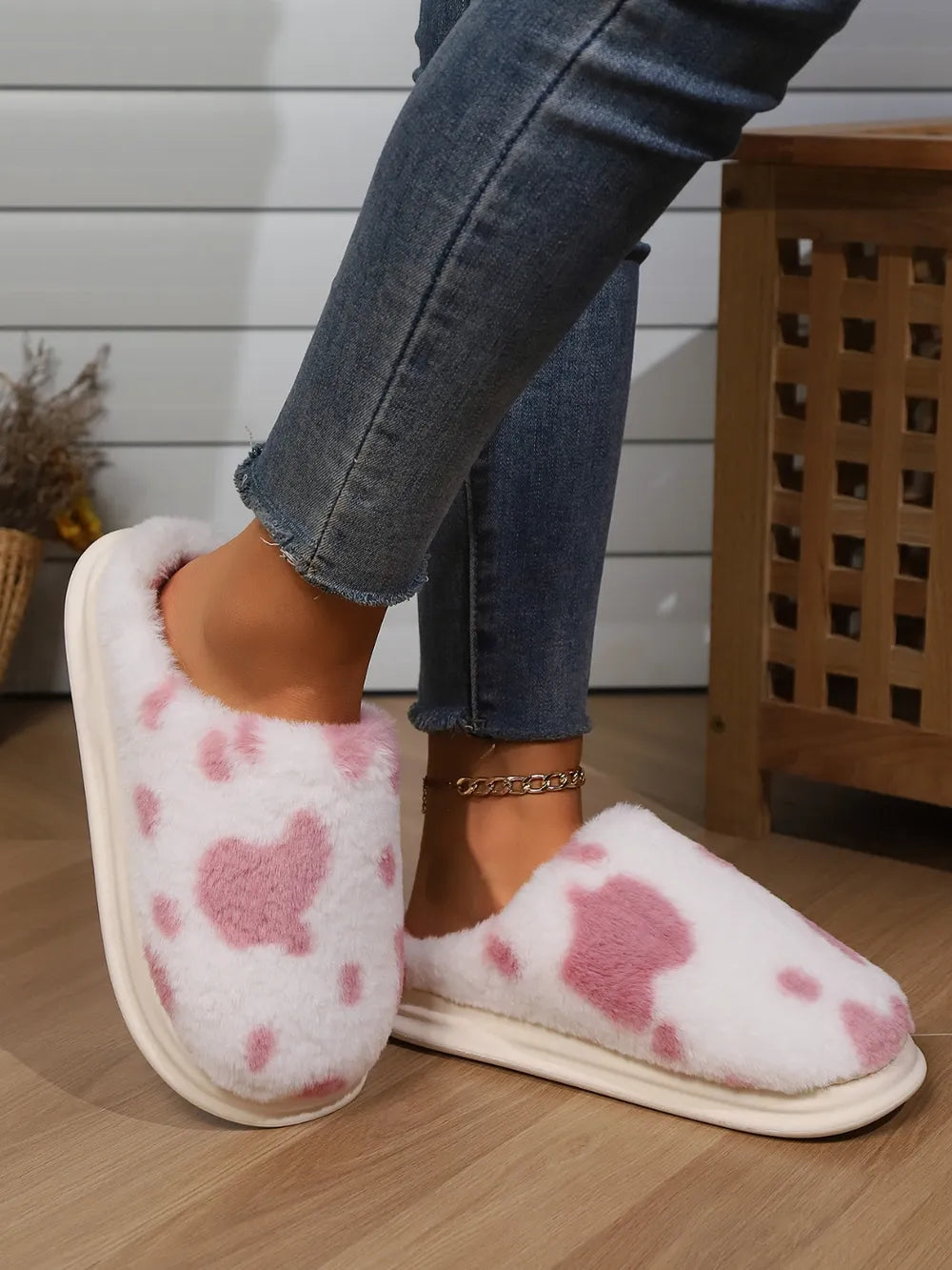 Blush pink cow print faux fur house slides with white soles