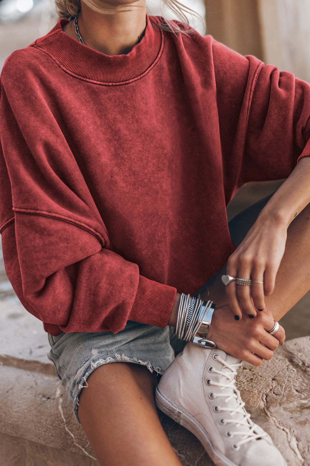 Acid wash mock neck sweatshirt in Deep Red with relaxed fit and ribbed cuffs.