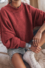 Acid wash mock neck sweatshirt in Deep Red with relaxed fit and ribbed cuffs.