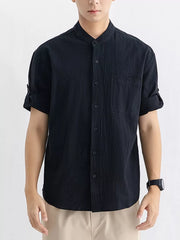 Black relaxed fit button-up shirt with mandarin collar and chest pocket