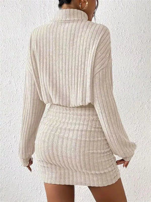 Cozy ribbed turtleneck mini dress in Dust Storm with long sleeves and a ruched skirt.
