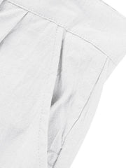 White relaxed fit sweatpants with pleats and pocket detail