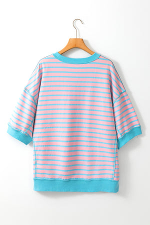 Blush pink and blue striped oversized sweatshirt with crewneck and cuffed sleeves