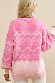 Pink acrylic knit pullover sweater with geometric pattern and colorblock detail.