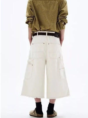 Men's white cotton wide-leg cropped cargo pants with frayed hem