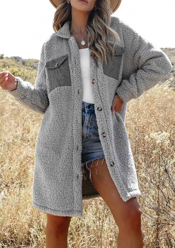 Gray sherpa coat with corduroy patch pockets and button front, styled with denim shorts.