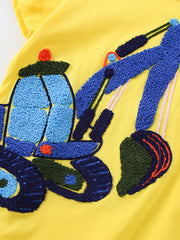 Yellow cotton t-shirt for kids with a textured blue excavator applique.