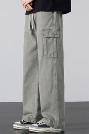 Gray relaxed fit cargo sweatpants with drawstring and button-flap pocket.