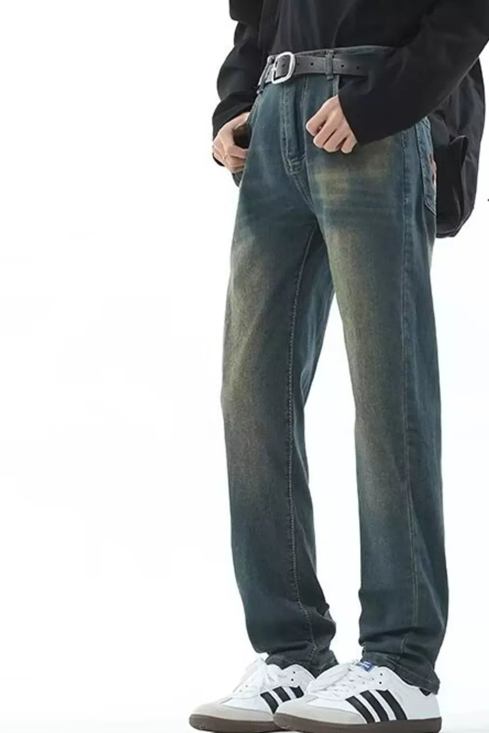 Men's vintage wash straight-leg jeans in blue denim with a faded, distressed look.
