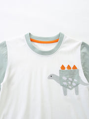 Toddler boys' white cotton tee with dinosaur pocket and grey sleeves.