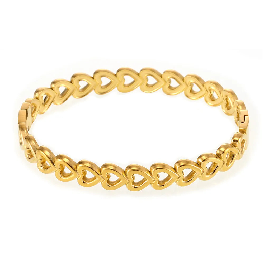 Gold heart motif chain bracelet with open heart charms