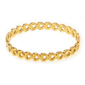 Gold heart motif chain bracelet with open heart charms