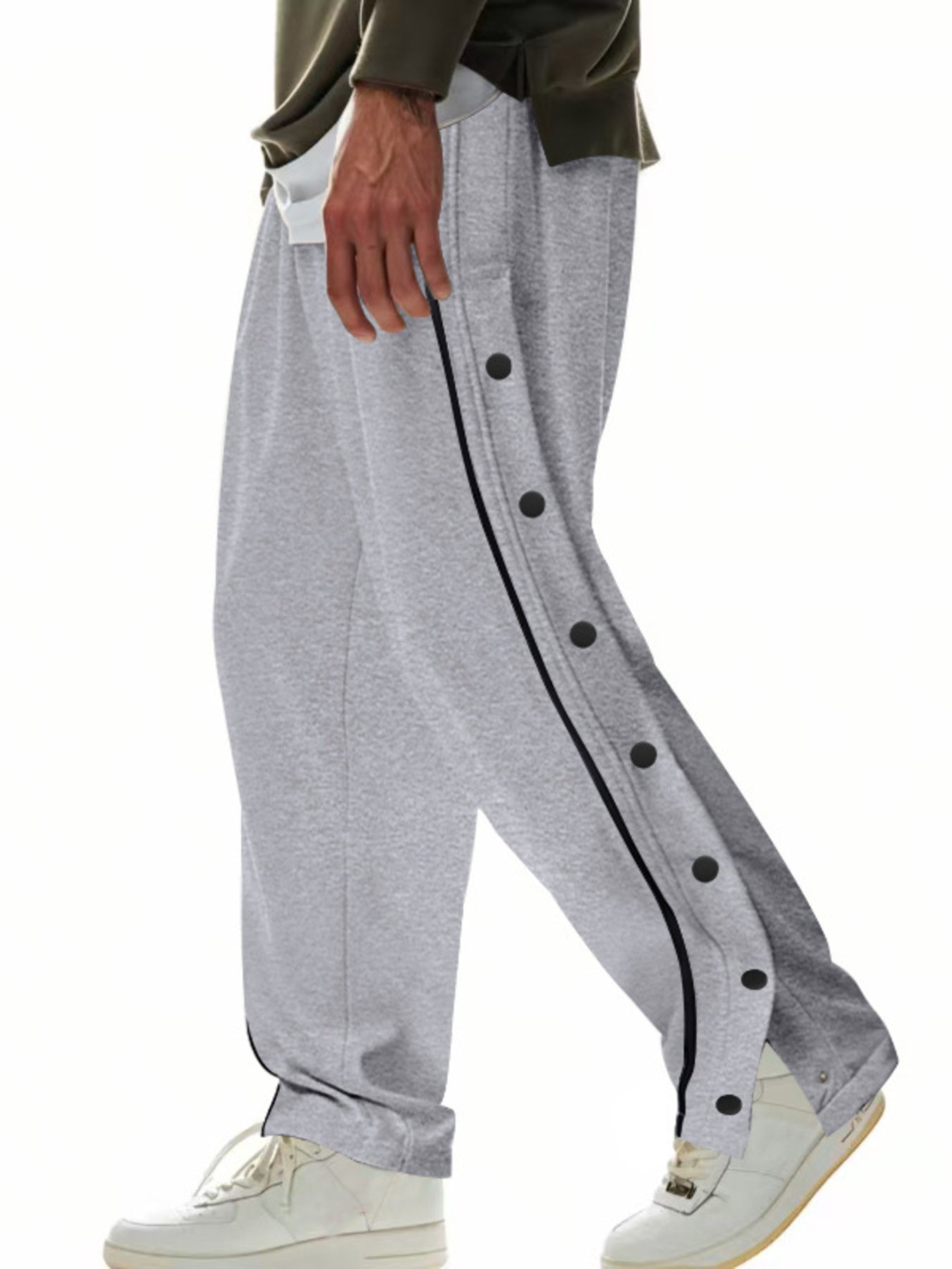 Grey track pants with full side snap buttons and black piping detail.