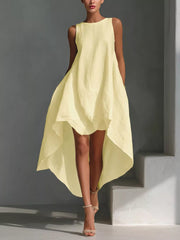 Pastel yellow sleeveless asymmetrical flowing dress with a high-low hem.