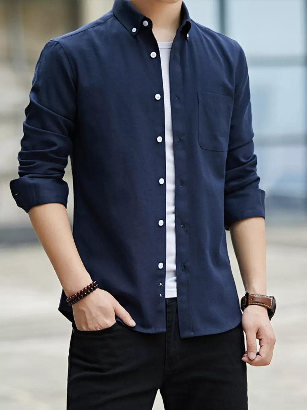Navy blue cotton casual button-down shirt with a chest pocket.