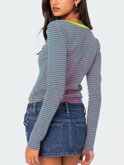 Striped long sleeve henley with contrast collar in pink and green.