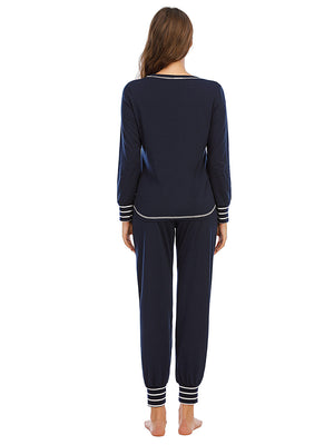 Dark Navy loungewear set with white striped trim on neckline, cuffs, and ankles.