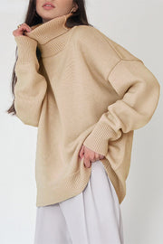 Khaki relaxed fit knit sweater with a roll neck and ribbed cuffs and hem.