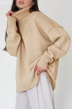 Khaki relaxed fit knit sweater with a roll neck and ribbed cuffs and hem.