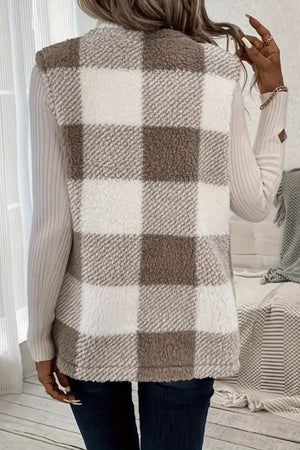 Oversized sherpa gilet in tan buffalo check pattern, with fuzzy texture.