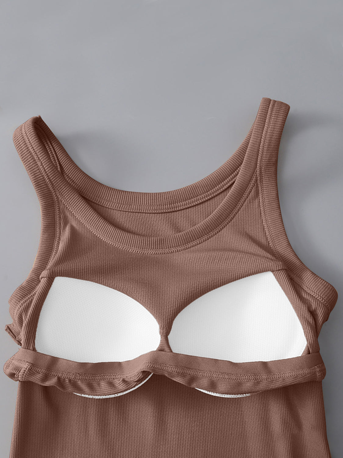 Brown ribbed knit tank top with built-in bra cups and scoop neckline.