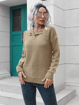 Khaki acrylic knit sweater with V-neck, button detail and keyhole cutout.